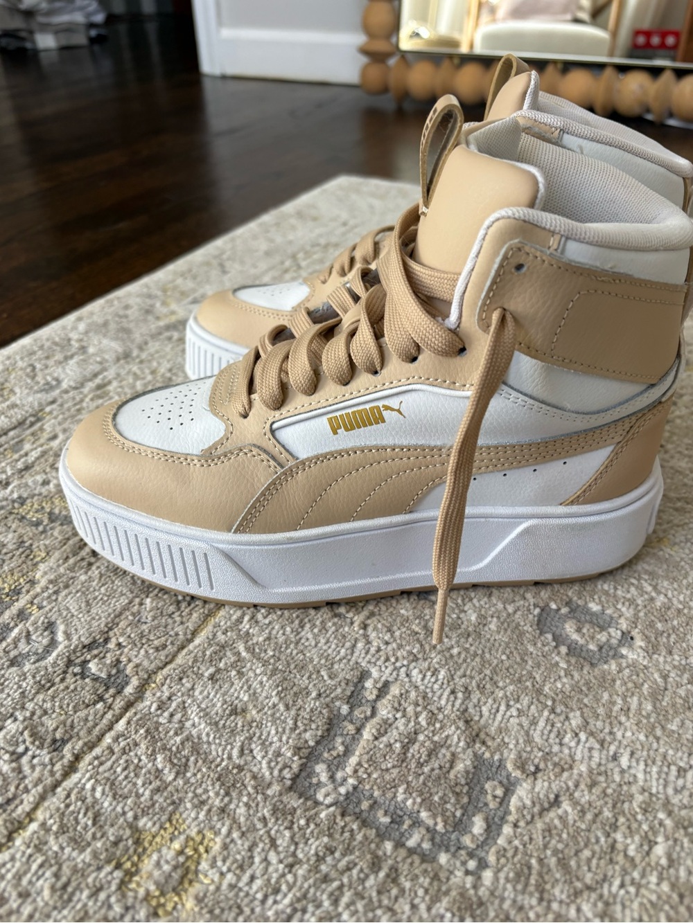 Puma Karmen Rebelle Mid sneakers platform sole in white and sand